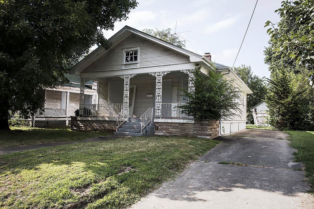 BLIGHT REQUEST: The properties at 1325 and 1329 E. Cherry St. are unsafe for living, Economic Development Director Sarah Kerner says. They were built in the early 1900s.