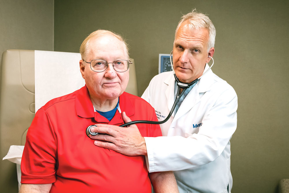 Cornelius Feeley, patient, and David Cochran, physician vice president