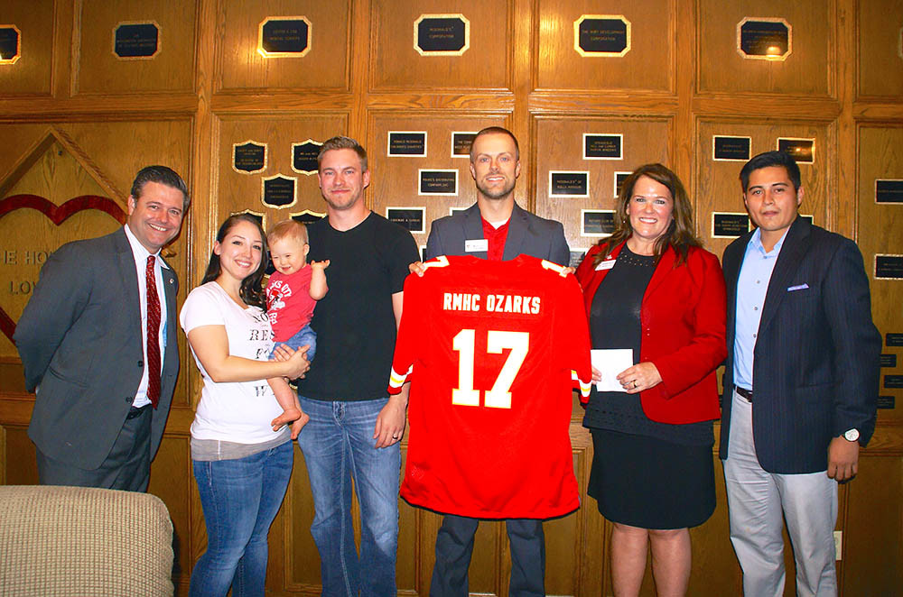 Go Big Red
For the first time, Springfield will take part in the Kansas City Chiefs Red Friday event Sept. 15. Partnering with Ronald McDonald House Charities of the Ozarks and 58 area McDonald’s, the restaurants will sell collector’s edition Chiefs flags for $5. Pictured is Chiefs Senior Vice President Bill Chapin, far left, RMHC’s the Drumright family, chairman Micah Scott and President/CEO Bonnie Keller, and McDonald’s Yamil Ocampo.