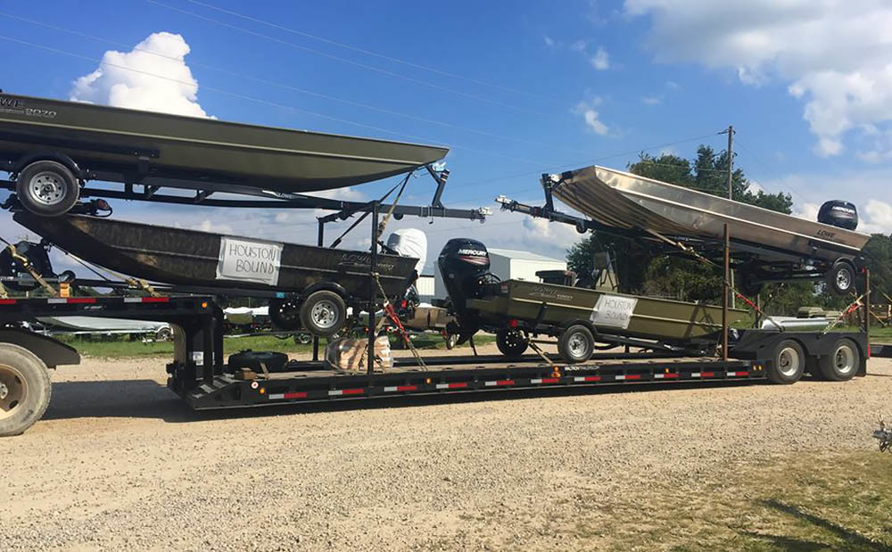 Lowe Boats prepares a shipment of Roughneck boats to be sent to the Houston area.