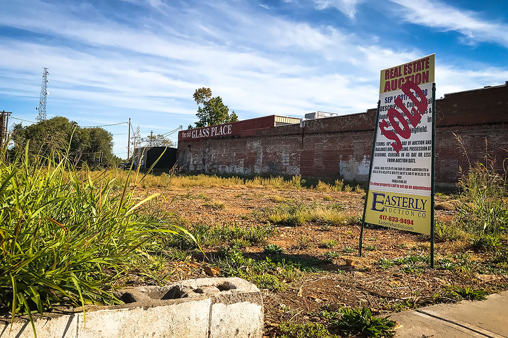 Tillman Redevelopment LLC buys downtown property next to The Old Glass Place.