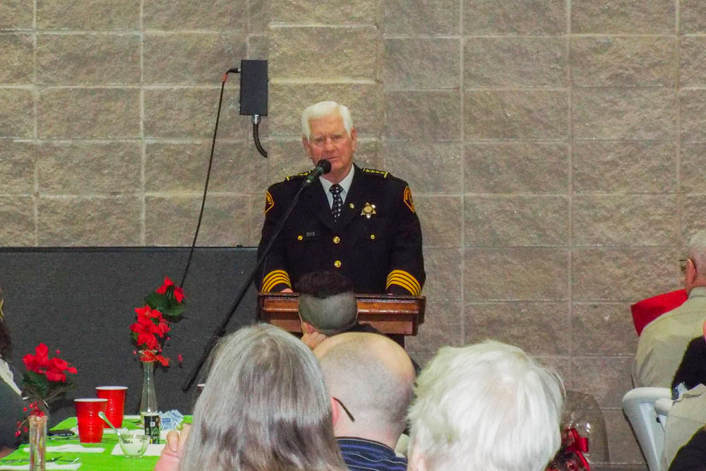 Deputy’s Honor
National Sheriffs’ Association President Harold Eavenson, the sheriff of Rockwall County in Texas, above, delivers the keynote address at the Christian County Sheriff’s Office Christmas banquet Dec. 12. Missouri Lt. Gov. Mike Parson also attended.