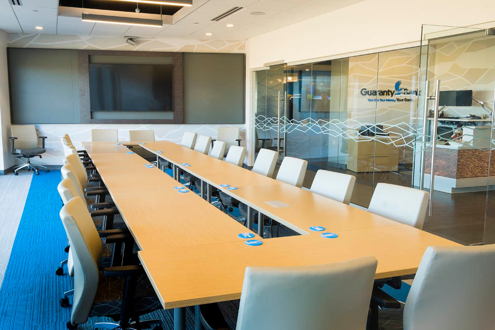 Modern Meetings
An emphasis on collaboration includes numerous conferences rooms varying in size from six to 18 seats. Chairs and tables also are moveable. Well-lit with floor-to-ceiling windows overlooking Farmers Park, the spaces include teleconferencing technology.