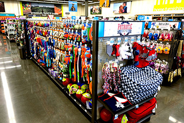 The store offers pet toys, food and apparel as well as a salon, dog training area, clinic and adoption center. photos by WES HAMILTON