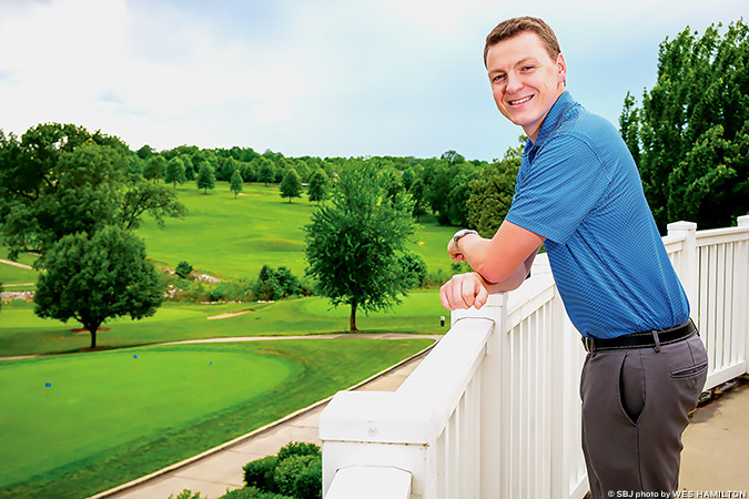 YOUNG GUN: John Bradish, the young general manager for Springfield Golf & Country Club, overlooks the course.
