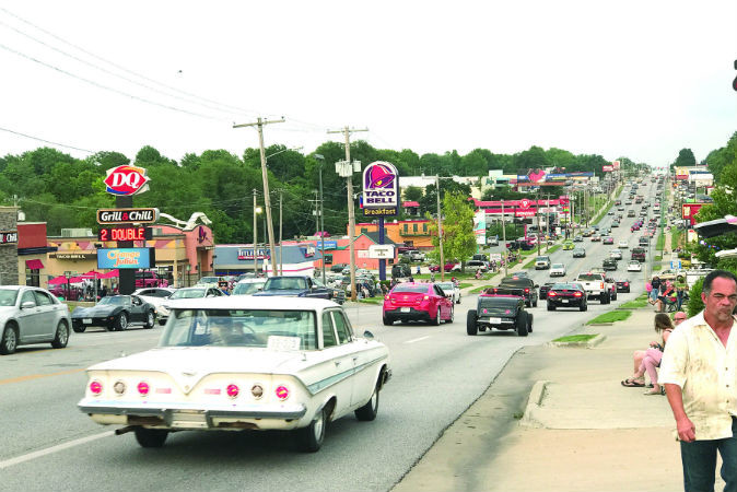 DRIVE TIME: Thousands of classic cars and their modern counterparts cruise Kearney Street on May 26.SBJ photo by EMILY LETTERMAN