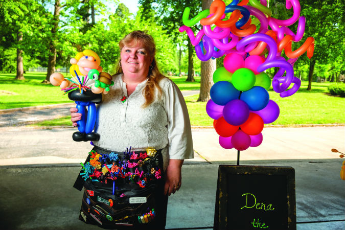 BALLOONING BUSINESS: Dena Atchley can twist balloons into cartoon characters and self-caricatures.SBJ photo by WES HAMILTON