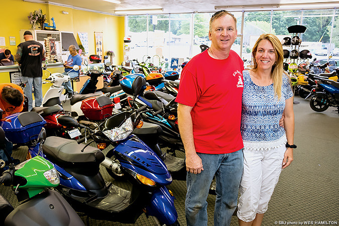 MOBILITY ADVOCATES: Co-owners Joe and Shanna Berrer take pride in helping customers find affordable means of transportation.