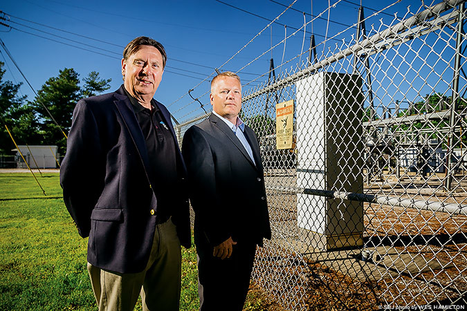ENERGY BOOST: Frank Fleming and Jay Lohrbach are teaming up to develop a battery-powered energy storage system at a City Utilities substation.