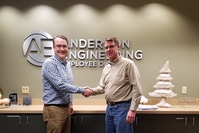 Anderson Engineering President and CEO Neil Brady cements a partnership with Bowers Engineering & Surveying Inc. President Troy Bowers.Photo provided by ANDERSON ENGINEERING INC.