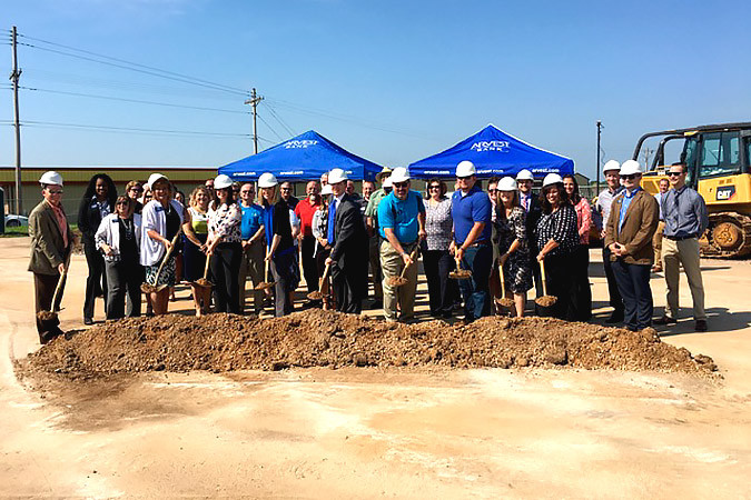 Nixa Chamber of Commerce, city of Nixa and Nixa Public Schools officials join Arvest Bank, representatives from DeWitt & Associates and Shaffer & Hines in a groundbreaking ceremony July 28.Photo provided by ARVEST BANK