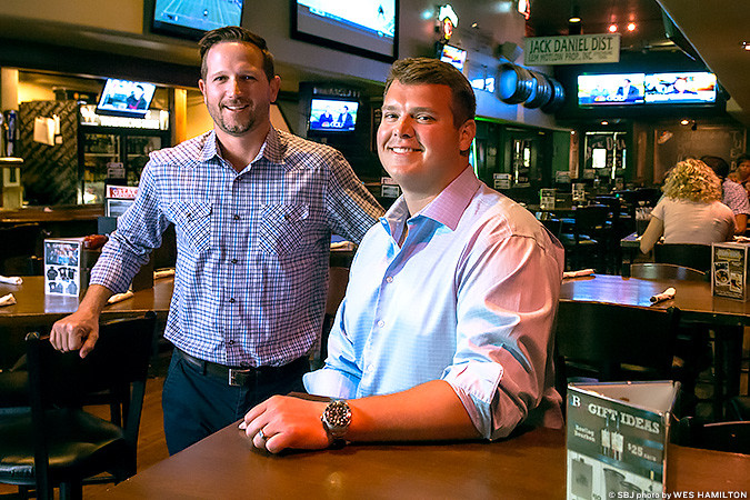 BIG GOALS: Big Whiskey’s co-owners Paul Sundy, left, and Austin Herschend plan for nine restaurants under the brand by early 2017.