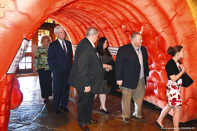 If humor is key to its success, the Colorectal Awareness and Prevention party didn’t disappoint as guests enter through an inflatable colon.