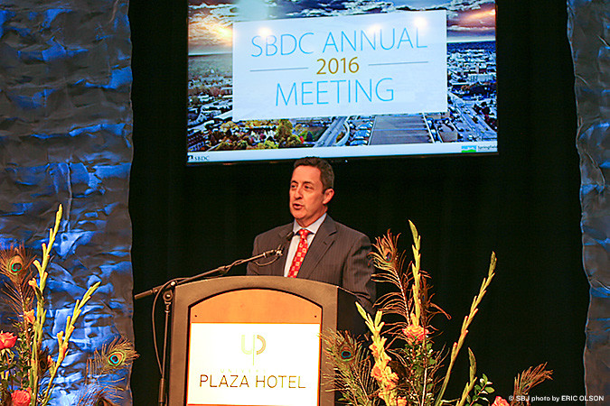 Outgoing SBDC President Tom Rankin, managing director with Sperry Van Ness/Rankin Co. LLC, welcomes participants to the organization’s annual meeting at University Plaza Convention Center.