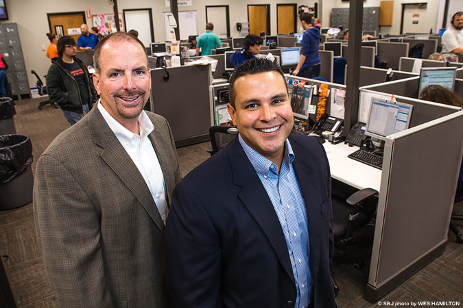 Gold Mountain Communications owner Hank Seevers, left, and Senior Vice President Ian McGuire have grown the telemarketing company to 500 employees from 15 in 2009.