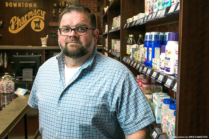 Licensed pharmacist Charles David Kerr opens a pharmacy near downtown on South Campbell Avenue.
