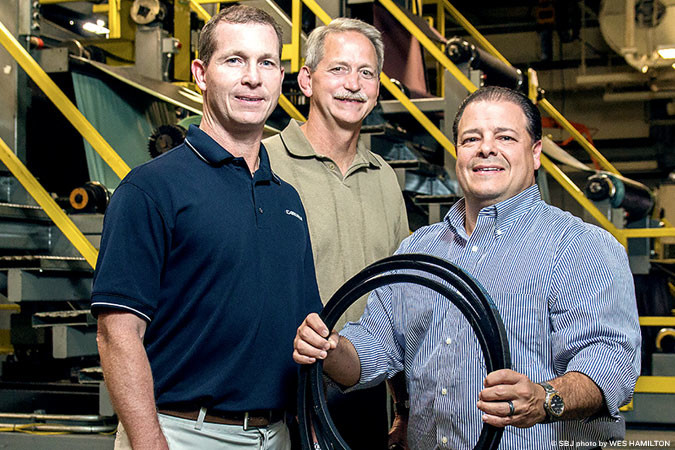 Plant Manager Rob Cowan, Director of Research and Development Kirk Bowman and President John Vassilaros drive the $140 million belt business.