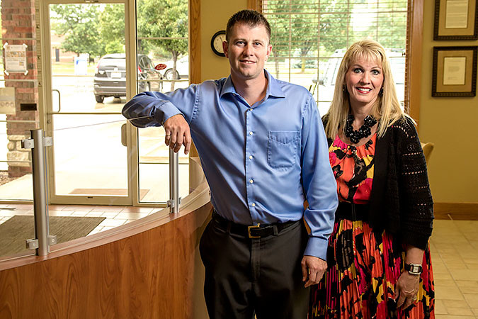 Justin Cox, regional president, and Jackie Bonner, regional market manager