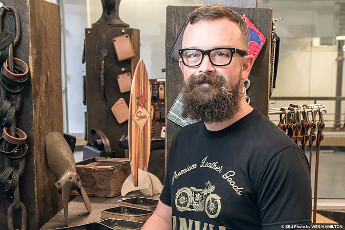 Ryan Wasson's hand-tooled leather goods shop opens on Park Central Square.