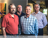 Thomas Everett, David Kessler, Bob Helm and P. Michael Pruett, partners