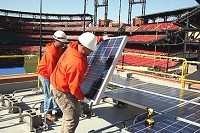 Workers install solar panels at Busch Stadium, the St. Louis home of the Cardinals.Photo provided by SOLAR ENERGY INDUSTRIES ASSOCIATION