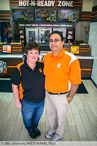 Beth and Carl Biondo spent around $300,000 to open their fourth Little Caesars store in the area in June. Upgrades to the company's other three locations are expected over the next eight years.