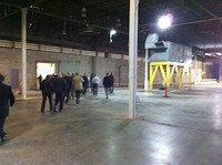 Solo Cup building owners Warren Davis Properties lead a tour of the available space with the roughly 60 SBDC members who attended the event. SBJ photo by BRIAN BROWN