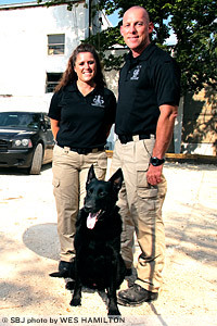 Brandy and Tim Brenner work with bomb-sniffing dogs at Southern Missouri Judicial Services.Click here for more photos.