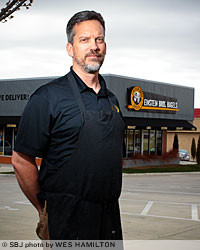 Mike Phillip of the Fayetteville, Ark.-based management group for two Einstein Bros. Bagels stores in Springfield says weekly revenue is up nearly 30 percent since a sale in October.