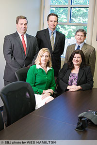 Standing, left to right, Brian Simms, CFO; Tim O'Reilly, CEO; and Steve Minton, chief architect and construction officer; sitting, left to right, Tonilee Watson, regional director of revenue management; and Courtney Brown, controller