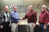 From left to right, Anderson Engineering CEO Steven Brady and President Neil Brady cement a merger agreement with Sprenkle &amp; Associates President Jason Eckhart and founder Kevin Sprenkle.Photo provided by ANDERSON ENGINEERING