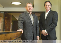 Dennis Marlin, CEO; and Doug Austin, vice president