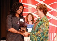 SBJ President Dianne Elizabeth Osis, right, presents an award to Francine Pratt, one of the 20 women selected for the 2010 Most Influential Women event.