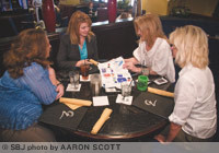 Left to right, Angie Pinegar of Missouri State University, Robin McGovern of Xanodyne Pharmaceuticals, Rebecca Alston of Advertising Plus and Franchela Krueger of Fran Bennett Memorial Golf Tournament meet for friendship and networking during lunch at Ocean Zen. They say it's a favorite because of its great location and space for meetings and speaking programs.