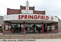 Dickinson's Springfield 8 renovation plans are on hold due to a tighter credit market.