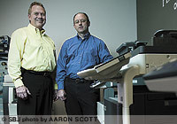Mike Kelly and Byron Pearson work together to grow Pearson-Kelly Office Products, which surpassed the $1 million mark in 2007.