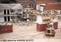 Demolition crews bulldoze The Arbor motel June 29. Manning Construction Co. Inc. of Olathe, Kan., Wicks Construction LLC of Springfield and Hillhouse Services of Verona cleared the site.
