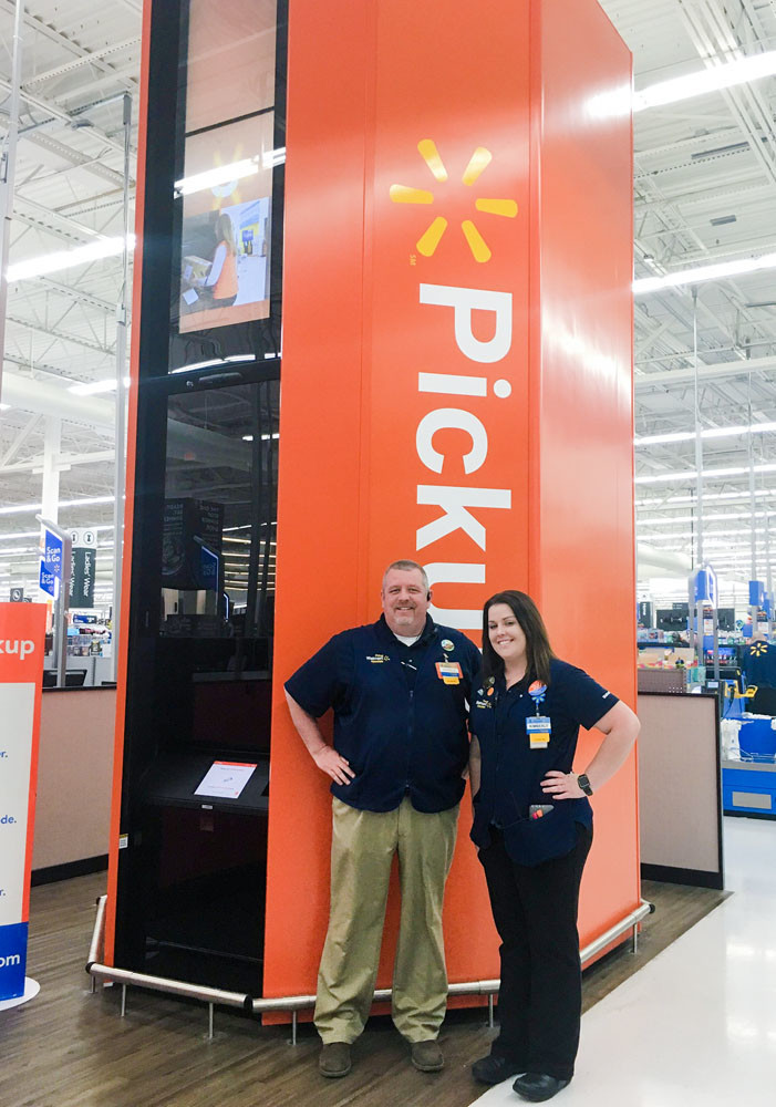 TECH TOWER
Walmart Inc. Store Manager Derrick Brentlinger and Online Grocery Pickup Assistant Manager Kim Whorton on May 1 unveil Springfield’s first Walmart Pickup Tower. Located at the Walmart Supercenter on East Independence Street, the 16-foot tower is a high-tech vending machine that takes online orders.