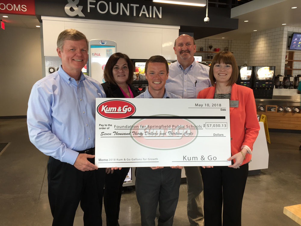 Fueling Growth
Kum & Go district supervisors Tim McCaleb, from left, Lori Suman, Graham McCaleb and Barry Green deliver a check to Foundation for Springfield Public Schools Executive Director Natalie Murdock. The funds were raised during the April 19 Gallons for Growth campaign, through which Kum & Go donated 3 cents for every gallon of gas pumped at its Springfield stores.