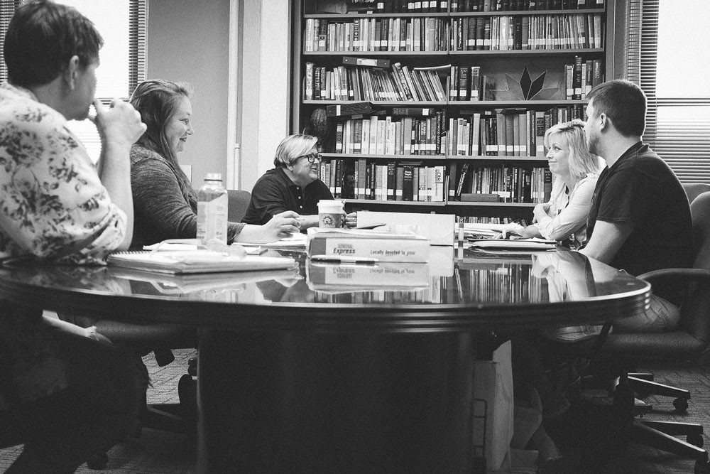 CALL TIME: Springfield Little Theatre staff gather for a weekly meeting. Beth Domann, center, leads discussion on the theater’s capital campaign and upcoming Frannie Awards.