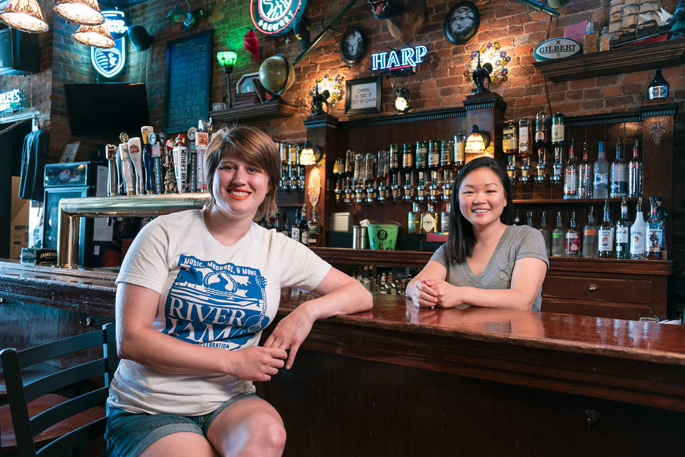 THE LAST STRAW: Anne Baker, right, co-owner of Finnegan’s Wake, and Christa Gammon of the James River Basin Partnership say removing straws from use in restaurants will soon become the standard.