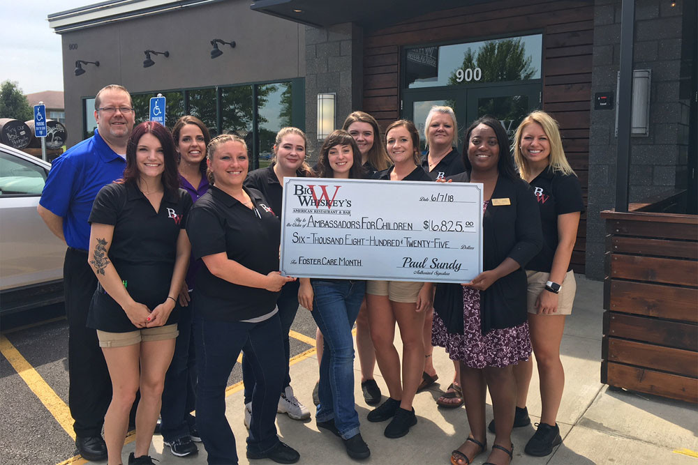 Foster Care Funds
Big Whiskey’s American Restaurant & Bar raised $6,825 throughout May to support Ambassadors for Children in honor of National Foster Care Month. The Darr Family pledged a match, bringing the total donation to $13,650. Big Whiskey’s has hosted the fundraiser since 2014.`