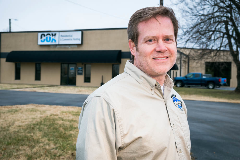 RAISING THE ROOF: President Ken Mills says Cox Roofing plans to add 10 employees in 2019, its 40th year in business.