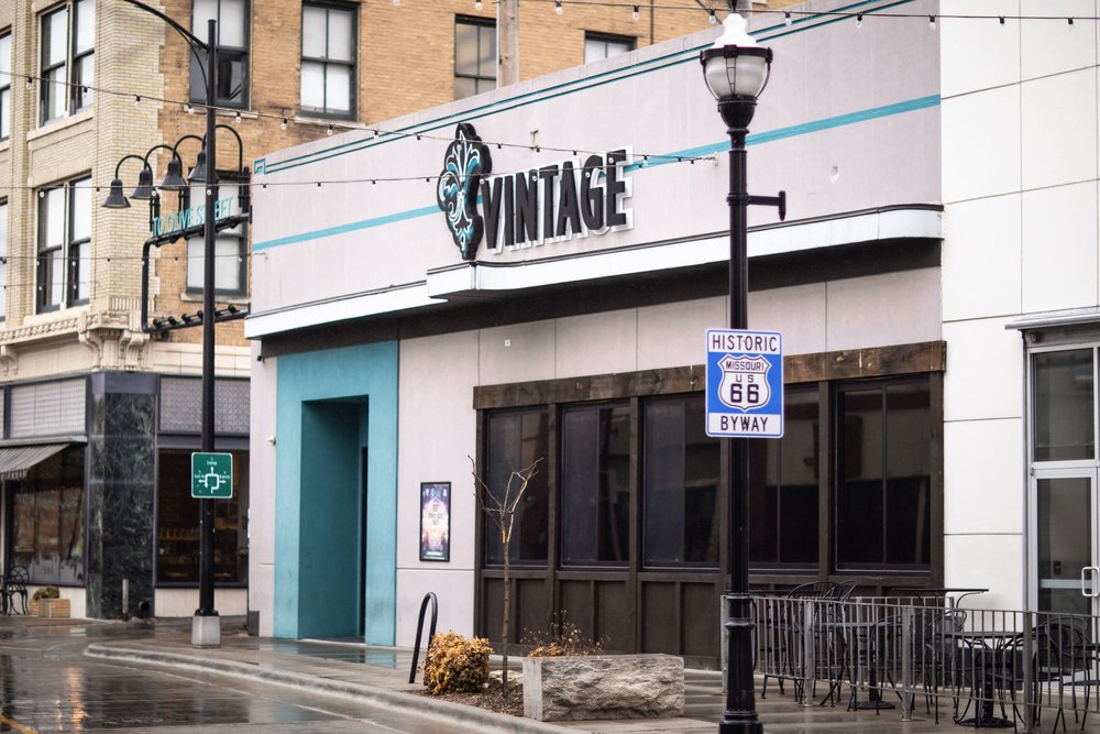 The owner of the Ernie Biggs building also is seeking to sell or lease the property currently housing the Vintage nightclub.