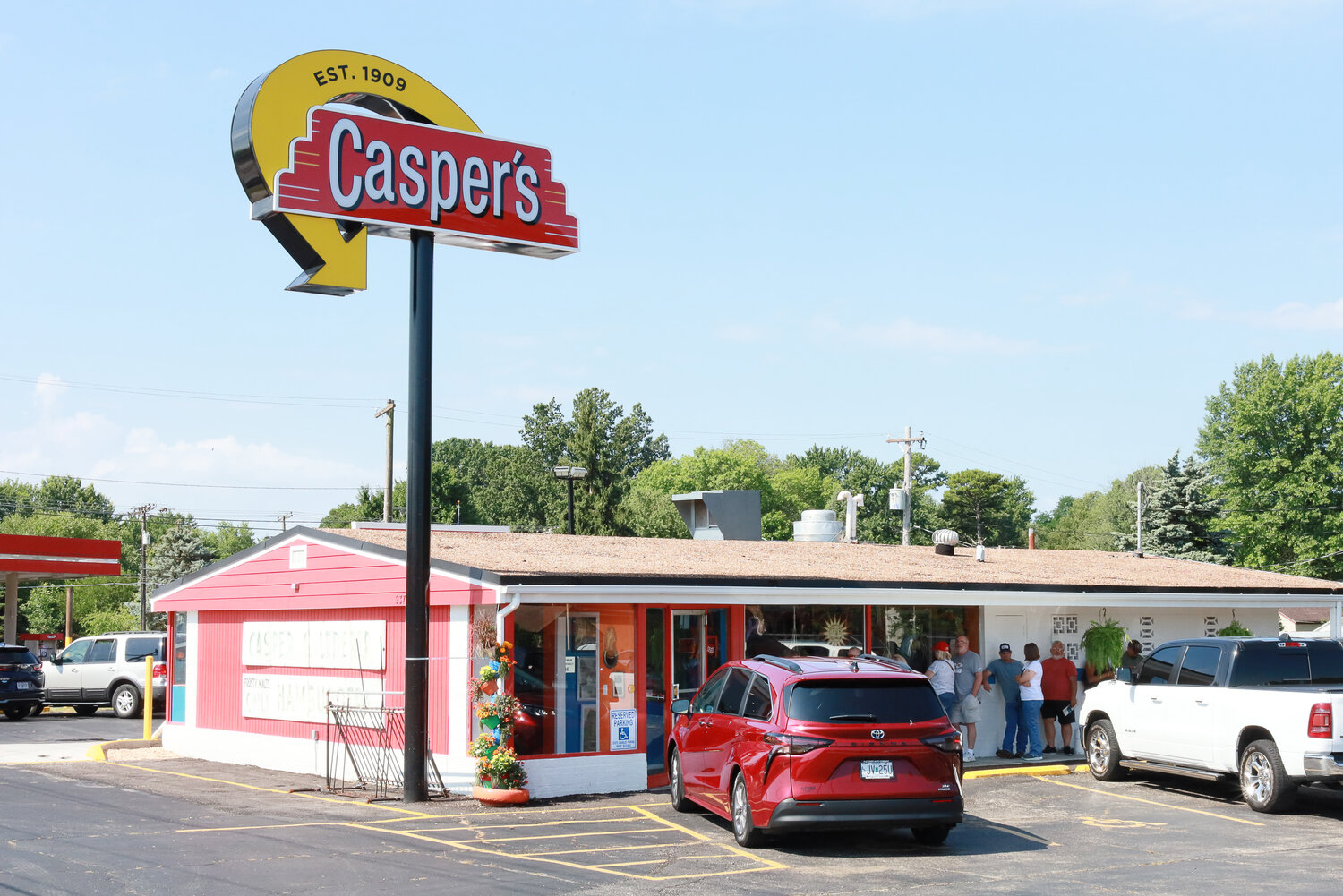Customers wait outside to be seated on Casper's reopening day.