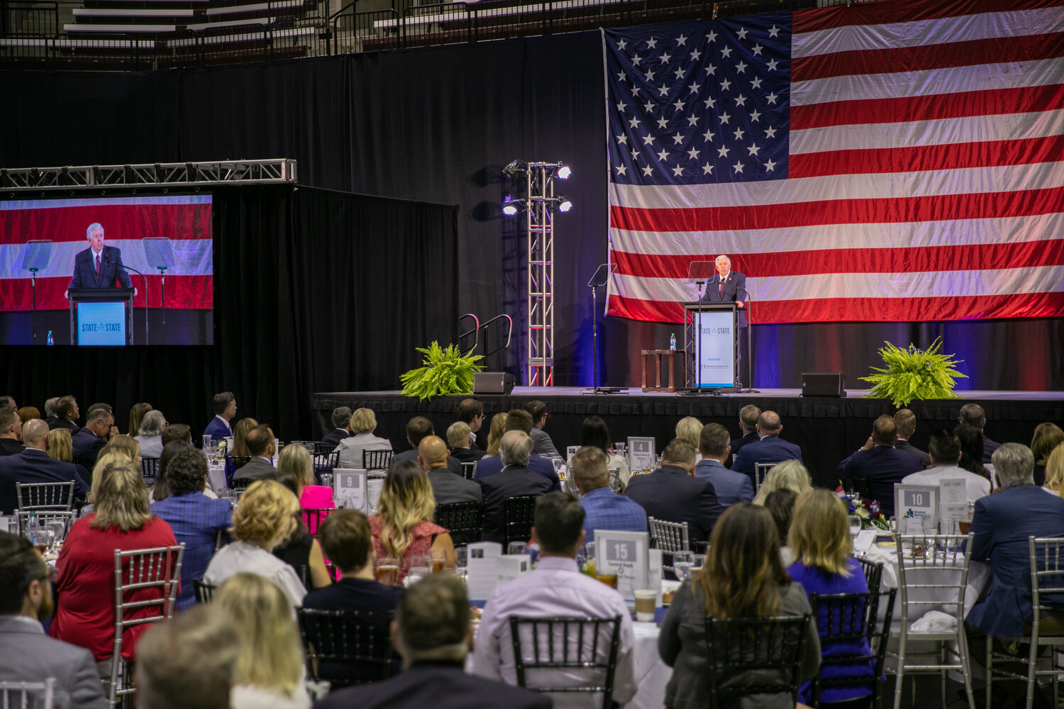 STATE INVESTMENTS: Gov. Mike Parson recounts infrastructure investments to a crowd of roughly 500 during the State of the State event held July 26 at Great Southern Bank Arena.
