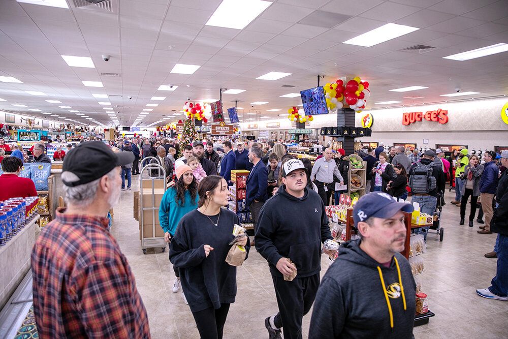 FAN FAVORITE: Customers line up on opening day at the 3284 N. Beaver Road travel center.