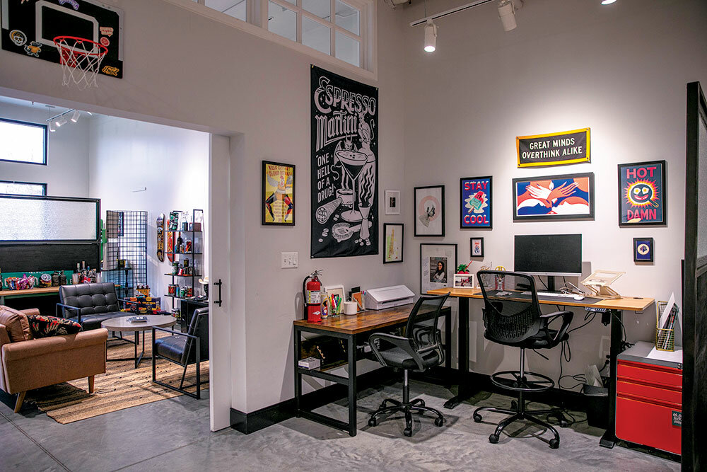 Personal Touch: The employees’ workspaces are plastered with art, which Sullivan says has been sourced largely from their personal collections and from friends. A basketball goal invites a playful atmosphere, and the crew doesn’t shy away from profanities on the walls. “Having a lot of space to put up things that inspire us,” Sullivan says, is a driving force in the office.