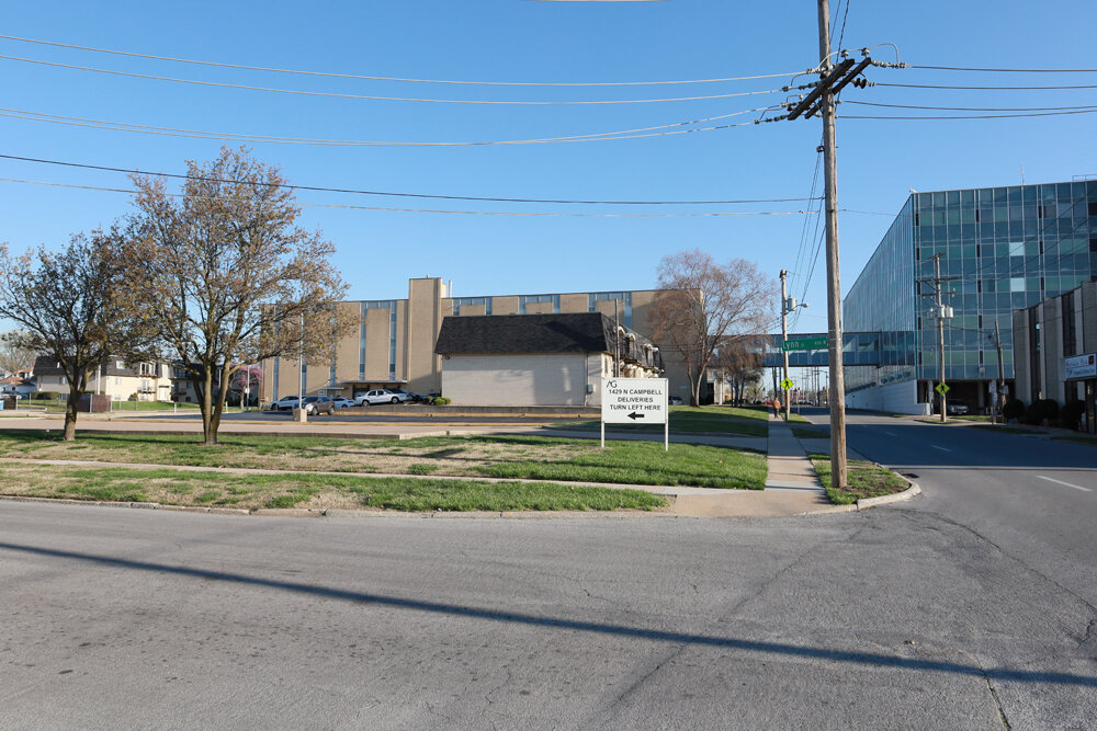 The buildings occupying the 8.9-acre property will be razed to accommodate the new middle school. Toward the back of this view from the corner of Campbell Avenue and Lynn Street shows an Assemblies of God warehouse that is included in the proposed sale.