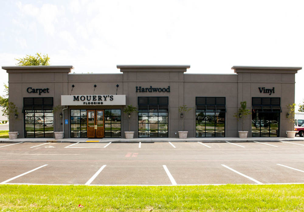 Mouery’s Carpet Center leaves space behind at a shopping center.